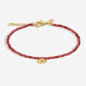 Mini Charms Garnet Eye Gold Plated Bracelet 8599